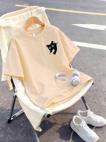 Esta camiseta casual de cuello redondo en color albaricoque está diseñada para niños ligeramente talla grande grandes, con un estampado creativo de gato, muy adecuada para niñas y adolescentes ligeramente mayores. Apta para el colegio, las compras, el estilo callejero y el uso vacacional. No solo es adecuada para el uso diario, sino también un excelente regalo para amigos y familiares. - Albaricoque - Ver 3