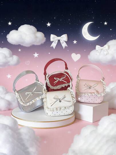 一款时尚甜美的手提包/斜挎包，韩版可爱风格，饰有爱心印花和蝴蝶结。适合日常购物、生日派对，也是馈赠亲朋好友的精美礼物。