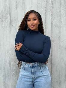 Women's Ribbed Long Sleeve Cropped High Neck Top With Thumb Loops - Navy Blue - View 1