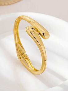 Bộ 3 vòng tay kiểu dáng tối giản mạ vàng, thiết kế bất đối xứng hình giọt nước, chất liệu dày dặn, bền chắc, làm từ kim loại nặng và hợp kim kẽm, thích hợp cho nữ giới. - Vàng - Xem 7