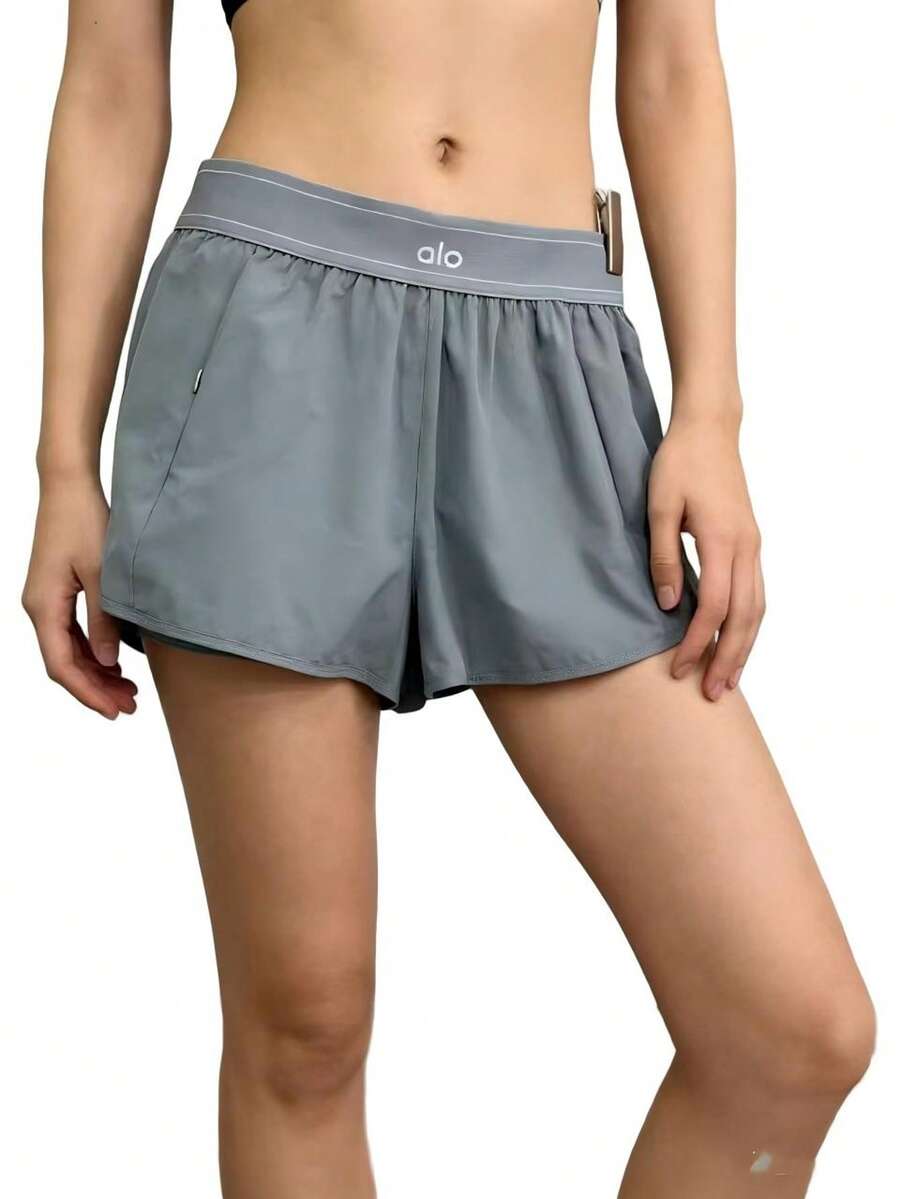 Alo Yoga Women's Grandstand Tennis Shorts | Lightweight Performance Fabric | Loose Fit Breathable Athletic Shorts | Luxury Studio-To-Street Comfortable Workout Bottoms - View 1
