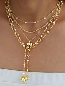 5件套简约时尚仿珍珠心形蝴蝶结Y型链项链套装，适合女性、情侣、姐妹、度假、约会、日常休闲、派对、婚礼、夏季海滩等场合，也是送给妈妈和朋友的礼物。 - 金黃色 - 查看 1