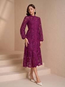 Đầm dài tay dáng chữ A cổ đứng thanh lịch, cài cúc kín đáo phía trước, tạo vẻ ngoài sang trọng tôn dáng cho phái nữ mùa xuân. - Màu đỏ tím - Xem 6