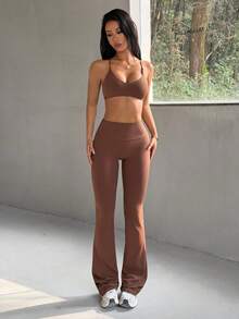 Bộ đồ thể thao nữ mùa hè màu trơn Aoqta gồm 2 mảnh, áo crop top không tay ôm sát, hở lưng gợi cảm, cổ chữ V sâu và quần ống loe cạp cao ôm dáng, trang phục tối giản cơ bản phù hợp cho yoga, chạy bộ, tập luyện và mặc hàng ngày. - Cà phê nâu - Xem 6