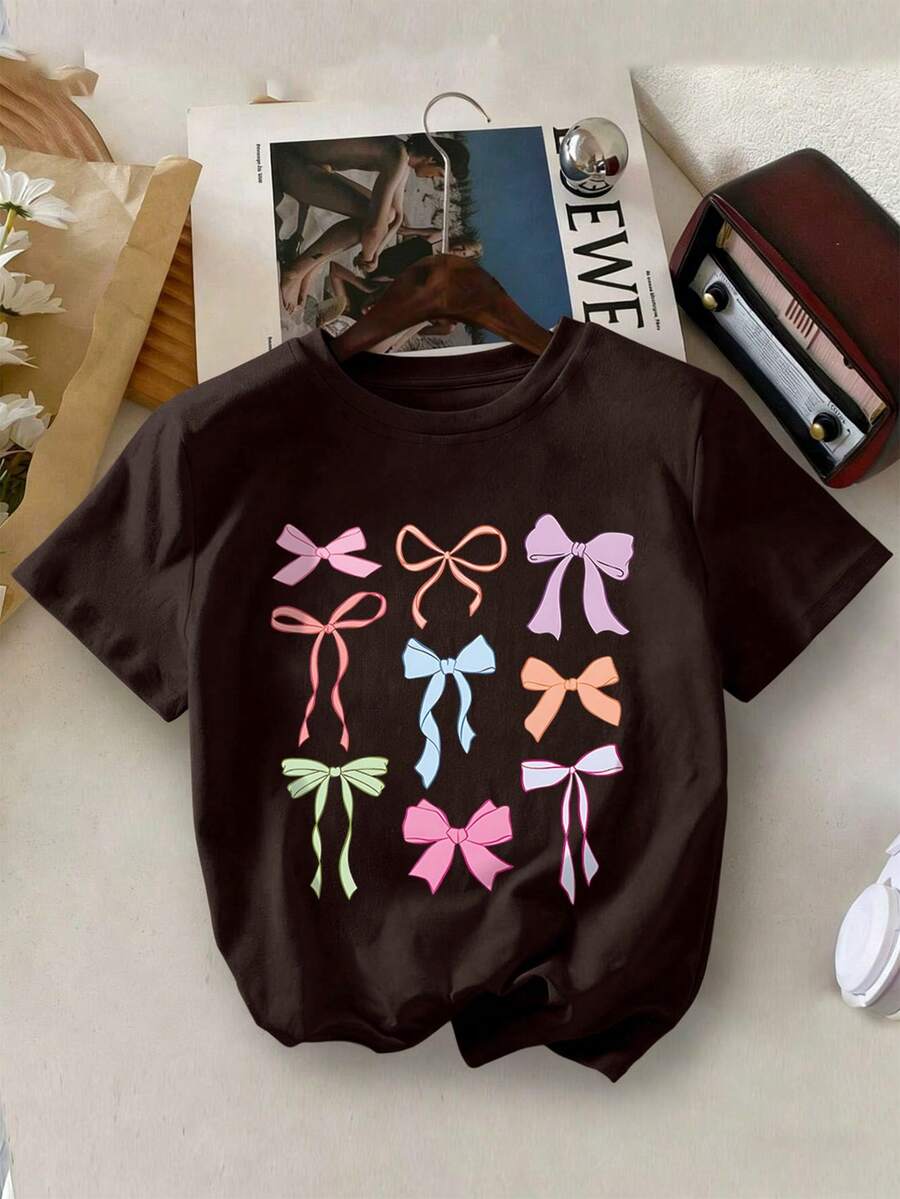 Camiseta de cuello redondo con estampado de lazo para niñas, top casual suave y cómodo para primavera y verano - Marrón - Ver 1