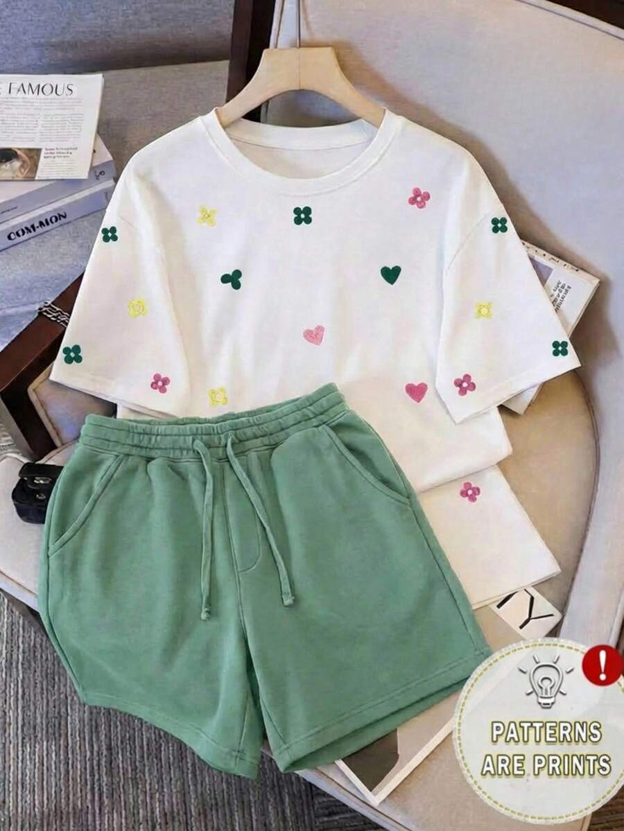 Conjunto casual de dos piezas para mujer - camiseta de manga corta con estampado de corazones + shorts con cordón, ropa cómoda adecuada para el uso diario. - Camiseta blanca + pantalón corto - Ver 1