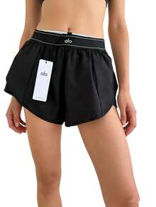 Alo Yoga Women's Grandstand Tennis Shorts | Lightweight Performance Fabric | Loose Fit Breathable Athletic Shorts | Luxury Studio-To-Street Comfortable Workout Bottoms - Black - View 9