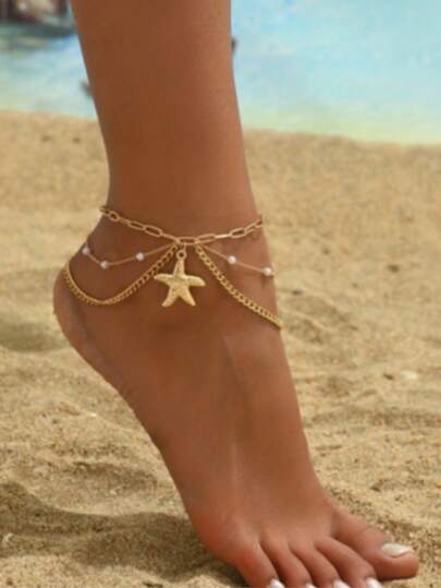 1. 优雅多层脚链，饰以人造珍珠和海星吊坠，8字形链条设计，是海滩和海边度假的理想之选