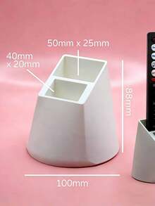 1 Giá đỡ điều khiển từ xa 2 lỗ, một giá đỡ để bàn tiện dụng phù hợp cho điều khiển từ xa của TV, máy điều hòa, đèn và đồ dùng văn phòng. Nó có thể chứa hai điều khiển từ xa, không cần nguồn điện và là một hộp đựng điều khiển từ xa trang trí có chức năng lưu trữ. - Nhiều màu - Xem 3