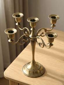 Chân nến nhiều nhánh bằng đồng cổ sang trọng, trang trí nhà cửa theo phong cách châu Âu cổ điển, tạo không gian lãng mạn, phù hợp cho phòng khách và trang trí ngày lễ. Vật trang trí để bàn bằng hợp kim kẽm phong cách Bohemian này rất lý tưởng để trang trí nhà cửa, trang trí lò sưởi, tiệc Giáng sinh, quà tân gia, đám cưới, nhà hàng và các buổi tụ họp. - Nhiều phong cách - Xem 16