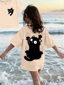Esta camiseta casual de cuello redondo en color albaricoque está diseñada para niños ligeramente talla grande grandes, con un estampado creativo de gato, muy adecuada para niñas y adolescentes ligeramente mayores. Apta para el colegio, las compras, el estilo callejero y el uso vacacional. No solo es adecuada para el uso diario, sino también un excelente regalo para amigos y familiares. - Albaricoque - Ver 1