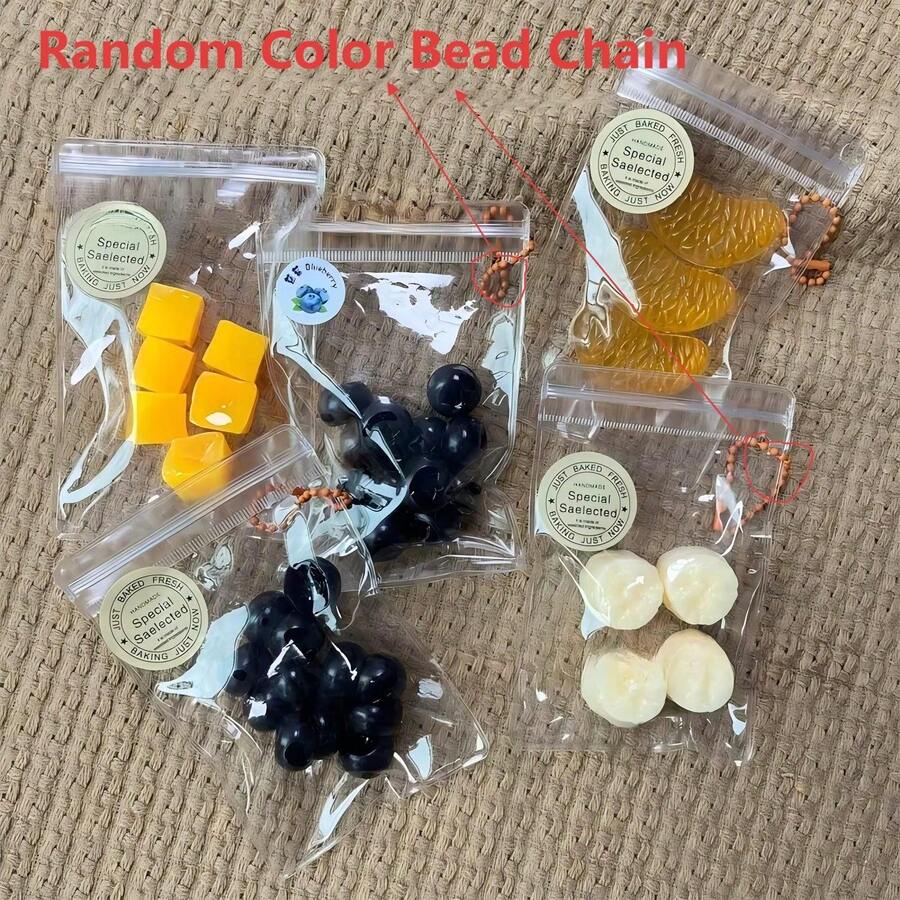 甜蜜水果！迷你蓝莓挤压玩具，终极减压好帮手。释放蓝莓魔力，迷你水果袋挤压玩具，随时随地享受乐趣！礼物之选，适合多动症患者，迷你桌面挤压玩具