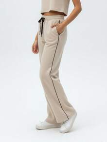 Dambyxor med dragsko och vardagskläder - Champagne - Visa 5