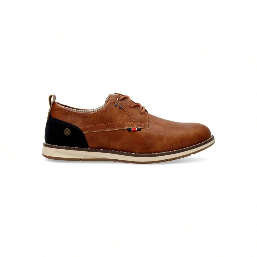 XTI Zapato de vestir estilo oxford hombre, Zapatos de vestir plano para hombre, Zapatos tipo casual cierre cordones - Modelo 145713 - Camel -
Zapato oxford de hombre, fabricado en material que i - Camel - Ver 1