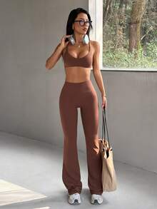 Bộ đồ thể thao nữ mùa hè màu trơn Aoqta gồm 2 mảnh, áo crop top không tay ôm sát, hở lưng gợi cảm, cổ chữ V sâu và quần ống loe cạp cao ôm dáng, trang phục tối giản cơ bản phù hợp cho yoga, chạy bộ, tập luyện và mặc hàng ngày. - Cà phê nâu - Xem 4