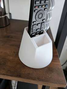 1 Giá đỡ điều khiển từ xa 2 lỗ, một giá đỡ để bàn tiện dụng phù hợp cho điều khiển từ xa của TV, máy điều hòa, đèn và đồ dùng văn phòng. Nó có thể chứa hai điều khiển từ xa, không cần nguồn điện và là một hộp đựng điều khiển từ xa trang trí có chức năng lưu trữ. - Nhiều màu - Xem 5