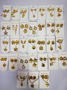Bộ trang sức 24 món bằng thép không gỉ với họa tiết trái tim hình học và hoa lá, lấy cảm hứng từ phong cách Trung Đông Dubai, mang đến vẻ hiện đại rạng rỡ. Thích hợp làm quà cưới, trang trí tiệc, quà năm mới hoặc phụ kiện đa năng cho mọi mùa (mẫu ngẫu nhiên). - Nhiều màu - Xem 8