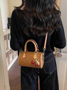 2026 经典迷你波士顿斜挎包，复古 PU 皮革水桶包，配樱桃吊坠，女士耐用轻便手提包，配有可调节肩带，小巧设计，完美收纳手机、钱包、化妆品，适合工作通勤、旅行、购物、约会，永恒的撞色设计，是送给时尚爱好者、生日、情人节、母亲节的理想礼物。 - 棕色 - 查看 4