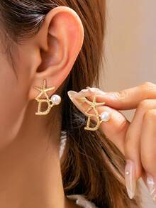 Pendientes asimétricos con forma de estrella de mar, estilo playa y océano - Amarillo Oro - Ver 1