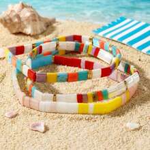 1条彩虹串珠手链，女士撞色弹力TL手链，适合夏季海滩、休闲、通勤、假日派对等场合，是送给家人、朋友和女友的理想礼物，也是夏季和度假的完美礼物。 - 彩色 - 查看 5
