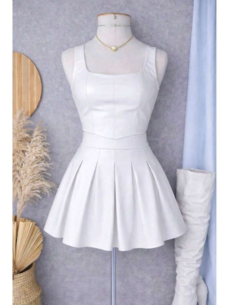 Conjunto Feminino Couro PU Cropped + Saia Rodada Cintura Alta Moda Blogueira  Festa  Casual  elegante    Couro PU    Plissado  Zíper    Saia  Noite  Formal e Noturno  Namorando  Férias    Outono  Inverno
