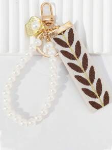 1 chiếc móc khóa thời trang trang trí ruy băng và ngọc trai giả, móc khóa xe hơi bằng vải dệt mới, phụ kiện hợp kim sáng tạo cho hộp đựng tai nghe và chìa khóa. - màu nâu - Xem 7