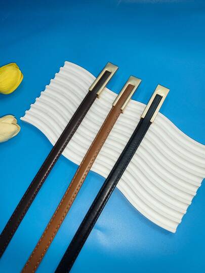 一款简约优雅的女士纤细腰带，适合通勤和休闲穿着，是必备的腰部配饰，多种颜色可选，适合全年佩戴等。