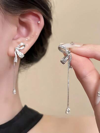 1 paire de boucles d'oreilles élégantes avec nœud papillon, boucles d'oreilles polyvalentes de luxe avec design à gland pour femmes