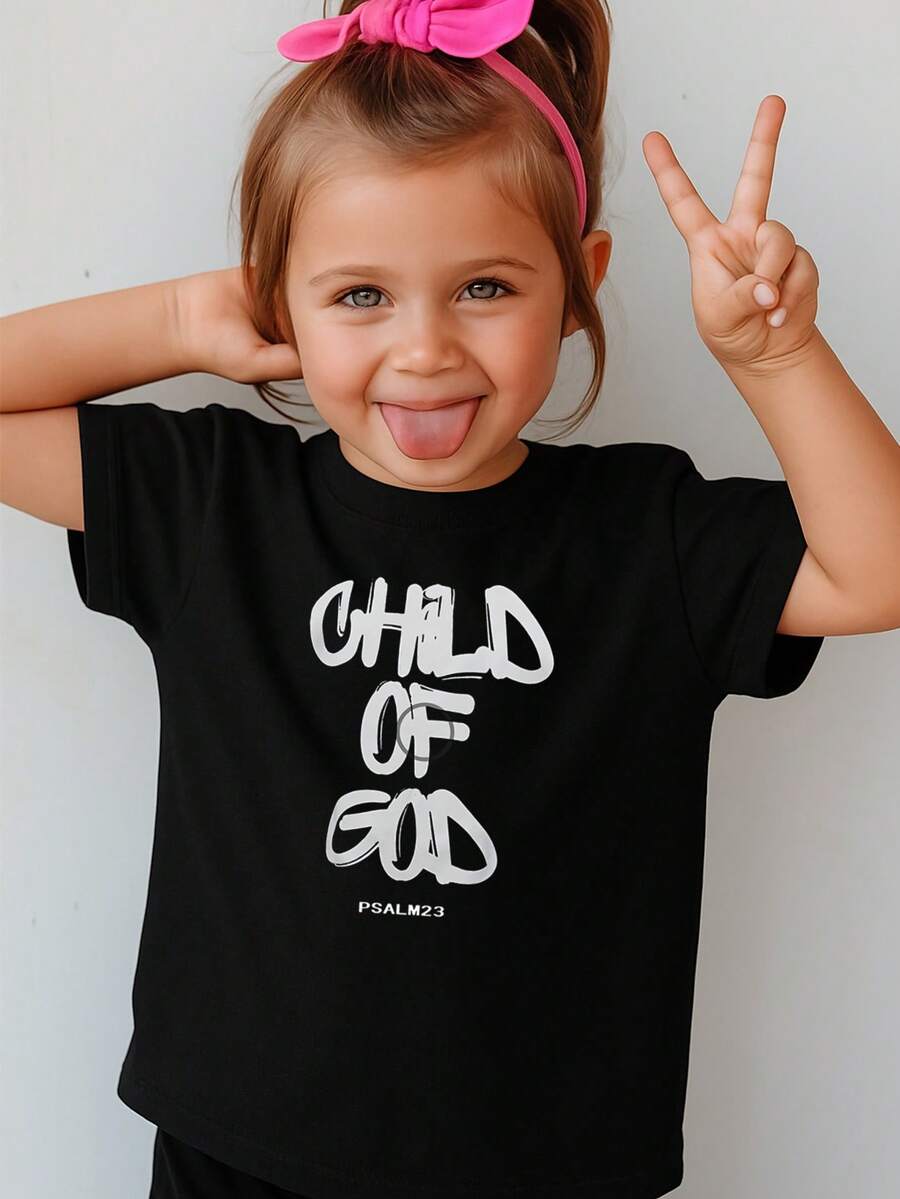 Camiseta de cuello redondo "Fe Cristiana" para niña/niño, 100 % algodón, con la frase "Niño de Dios, Salmo 23", con estampado artístico inspirador cristiano, largo regular, ideal para la iglesia, el gimnasio y ropa informal. Un toque nostálgico para las celebraciones de Pascua. Perfecta para primavera/verano, Pascua y otras festividades. Moda, regalo de Pascua para niña y niño. Camiseta de cuello redondo lavable a máquina. Suave y transpirable. Ajuste cómodo. - Negro - Ver 1