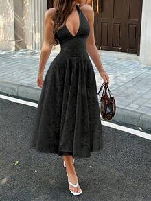 Abito midi estivo Unadoll in jacquard floreale, con scollo all'americana, profondo scollo a V sulla schiena, laccio, fluido, elegante, da invitata a matrimonio e per feste - nero - Visualizzare 2