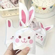 50个复活节兔子礼品袋，带耳朵和可活动眼睛，适合存放雪花饼干、零食、烘焙食品、巧克力、糖果。适用于生日、婚礼、送礼派对等场合。糖果和饼干礼品袋。适用于复活节、感恩节、儿童节、圣诞节和其他节日。适用于家庭大宗塑料包装。 - 查看 2
