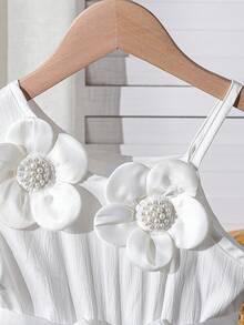 Đầm hè dáng casual cho bé gái, họa tiết hoa 3D, dây mảnh, viền bèo nhún, thắt nơ, chân váy xếp ly, kiểu dáng thời trang và thanh lịch tối giản, phù hợp cho mặc hàng ngày, dự tiệc và các dịp trang trọng. - trắng - Xem 6