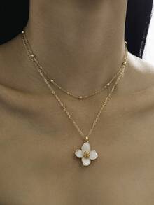 1件优雅白色珐琅四瓣花双层吊坠项链，适合日常佩戴、约会、婚礼，精致女士珠宝，情侣礼物（由于手工制作，链子上的珠子数量可能有所不同，但最终长度保持一致） - 白色 - 查看 1