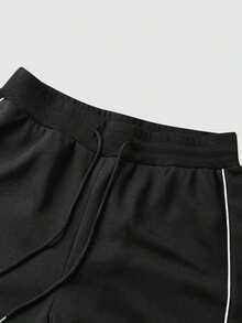 Pantalones casuales sueltos con cintura con cordón y bolsillos a rayas para hombres - Negro - Ver 8