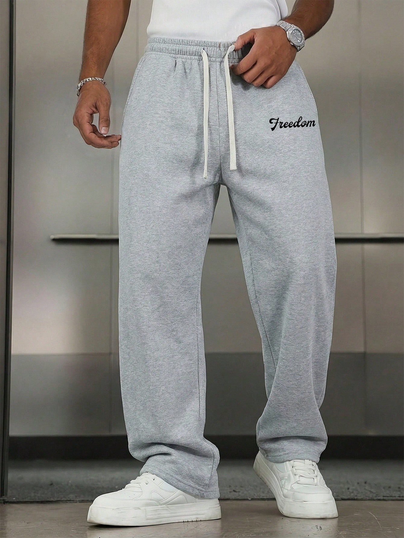 بنطلون رياضي واسع الساق مطبوع عليه حرف، بنطلون أسو...