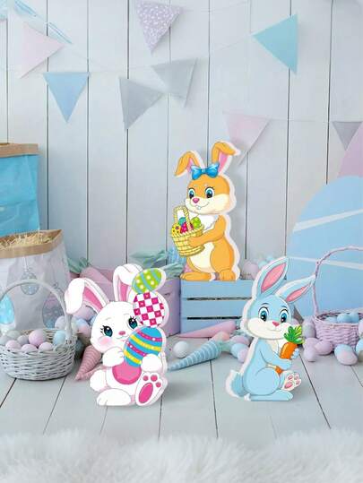 3 Packs Easter Bunny Decorations - Cute Cartoon Bunny Cutouts (Blue With Carrot, Orange With Easter Egg Basket, White With Easter Eggs) For Easter Party, Home Decor, Table Centerpieces, Photo Props, Egg Hunt - Lightweight, Vibrant Festive Ornaments
