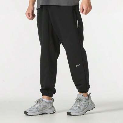 Nike Quần dài dệt kim cạp chun, quần thể thao nam thường ngày, quần tập luyện & chạy bộ FZ0225-010