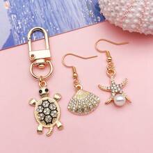 30个混合款式海洋主题水钻吊坠，包括海星、海龟壳等，适用于手链、耳环等工艺品。 - 均碼 - 查看 6