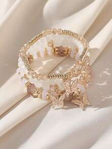 Bộ 4 chiếc vòng tay co giãn thủ công kiểu Bohemian đính cườm hình hoa và bướm dành cho nữ, phong cách nghỉ mát biển, vị trí mặt dây chuyền hình bướm ngẫu nhiên. - trắng - Xem 6