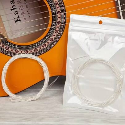 6pcs/Set Classical Guitar Strings, Nylon Silver Strings Set, 6pcs Replacement Nylon Guitar Strings For Classical And Acoustic Guitar - Heavy Nylon Construction, Durable Tension - Enjoy Richer Sound, Smooth And Durable Strings, Anti-Corrosion, Enhance Sound Quality And Extend Lifespan, Individually Packaged, High-Quality Guitar Accessories, Musical Instrument Accessories, Suitable For Guitar Decoration, Music Decoration, Music Gifts, Outdoor Performance Accessories, Music Festival Supplies, Teaching Classroom Supplies, Guitar Gifts, Party Gifts, Perfect Gifts