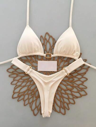 Bộ bikini gợi cảm màu trơn dành cho nữ, thích hợp mặc đi biển mùa hè.