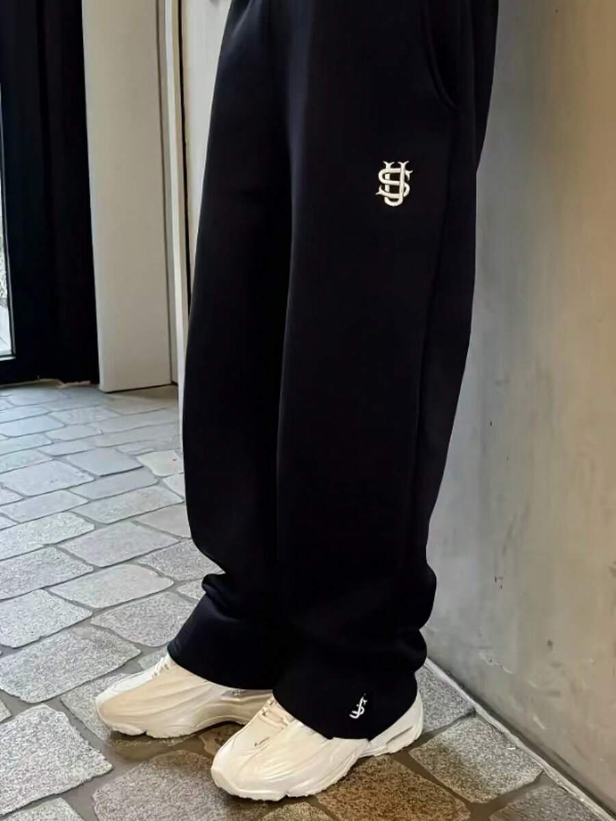 男士独特印花翻边开衩下摆休闲户外街头裤，宽松印花运动裤，四季皆宜 - 黑色 - 查看 1