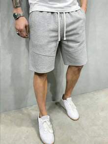 Quần short thể thao nam dáng rộng, thoải mái, phù hợp cho tập thể dục, bóng rổ, tập luyện, chạy bộ, tập luyện, dạo phố, cắm trại, bãi biển. Thiết kế cạp chun co giãn với dây rút điều chỉnh, thích hợp cho mùa hè. - Màu Xám nhạt - Xem 5