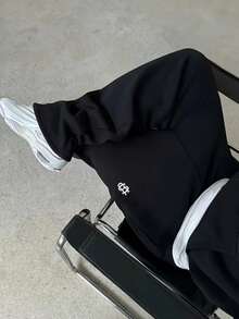 男士独特印花翻边开衩下摆休闲户外街头裤，宽松印花运动裤，四季皆宜 - 黑色 - 查看 3