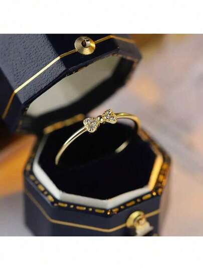 1件S925纯银精致时尚微镶少女蝴蝶结戒指，镀18K金