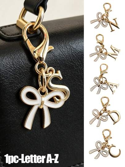 Llavero/colgante de bolso con lazo blanco y letra del alfabeto A-Z, adecuado como regalo de cumpleaños y festividades para amigos, novias y familiares. Accesorios únicos para teléfonos, diseño minimalista, aplicable a carteras y accesorios de teléfonos de mujer, regalos para amigos, familia, novias, accesorios para exteriores, accesorios para fiestas, regalos, recuerdos, colgantes de bolso de mujer, colgantes de coche, regalos para mujeres y niñas