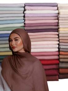 1条高品质女士纯色莫代尔头巾,优质宽边双缝包边,轻盈透气舒适面料,适合日常佩戴,也可搭配长袍穿着。 - 彩色 - 查看 13
