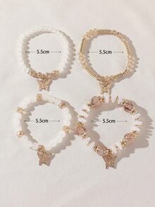 Bộ 4 chiếc vòng tay co giãn thủ công kiểu Bohemian đính cườm hình hoa và bướm dành cho nữ, phong cách nghỉ mát biển, vị trí mặt dây chuyền hình bướm ngẫu nhiên. - trắng - Xem 4