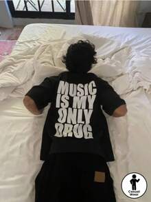 Unisex T-Shirt "Musik Ist Mein Spiritueller Lebensunterhalt" – Black/White, Crew Neck, Street Style, Breathable – For Car Enthusiasts. - Black - View 2