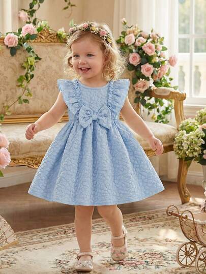 女婴夏季新款蝴蝶结装饰荷叶边下摆浅蓝色甜美连衣裙